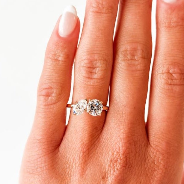 Toi & Moi Pear Shape and Round Moissanite Engagement Ring